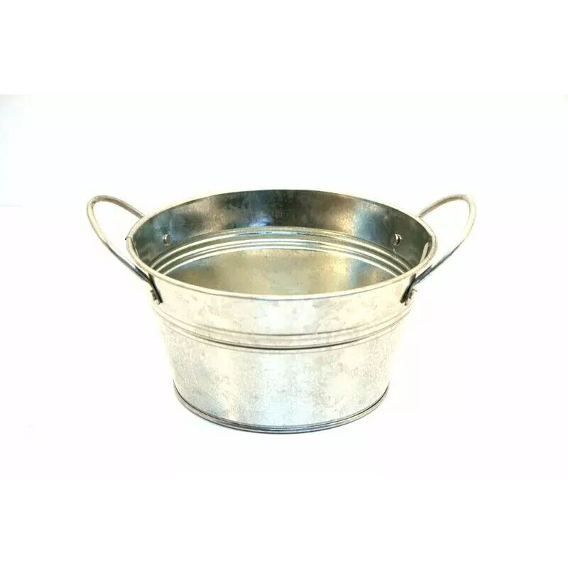 Jardinière ronde en zinc naturel avec anses pour compositions florales et décoration florale professionnelle