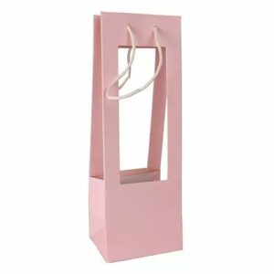 Sac porte bouquet fleuriste en carton rose pâle dimensions 13x10,5x38 cm pour transport compositions florales