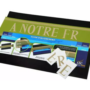 Guide d'alignement magnétique bleu posé sur un ruban de deuil vert avec lettres dorées à reporter